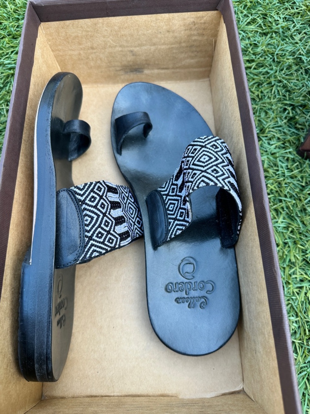 Black Patterned Toe-Loop Slide Sandals by Corleone